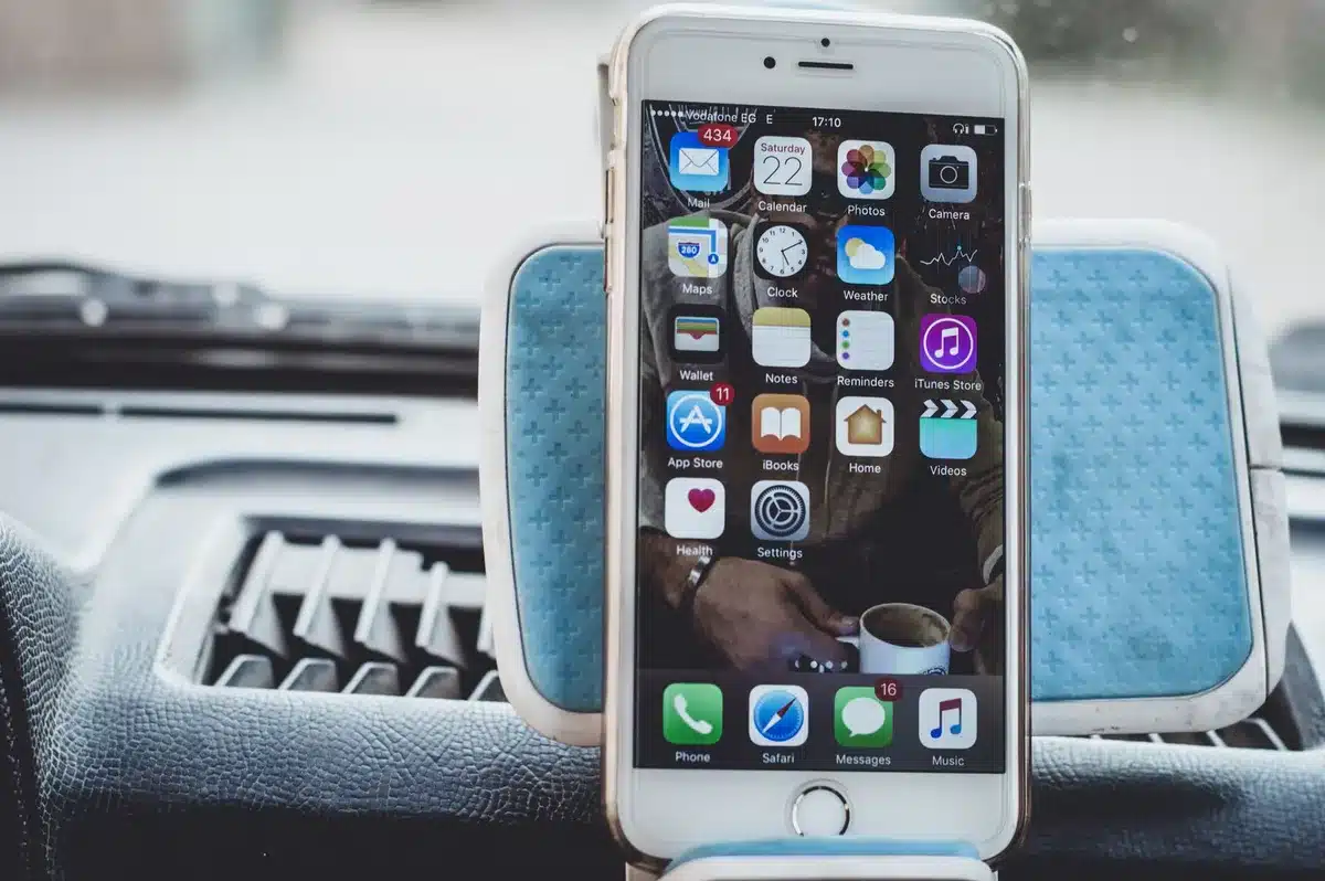 Empty iPhone on a table showing a generic software update screen, no brand logos or identifiable marks