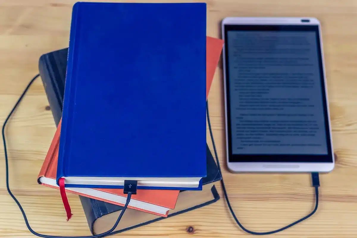 slim e-reader on a neutral tabletop, flush display visible, no logos