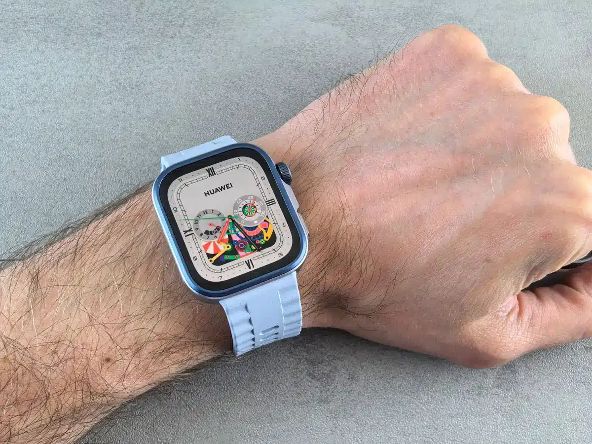 A close-up of an unbranded sports smartwatch on a neutral wristband, screen lit showing generic running metrics; no logos or text visible