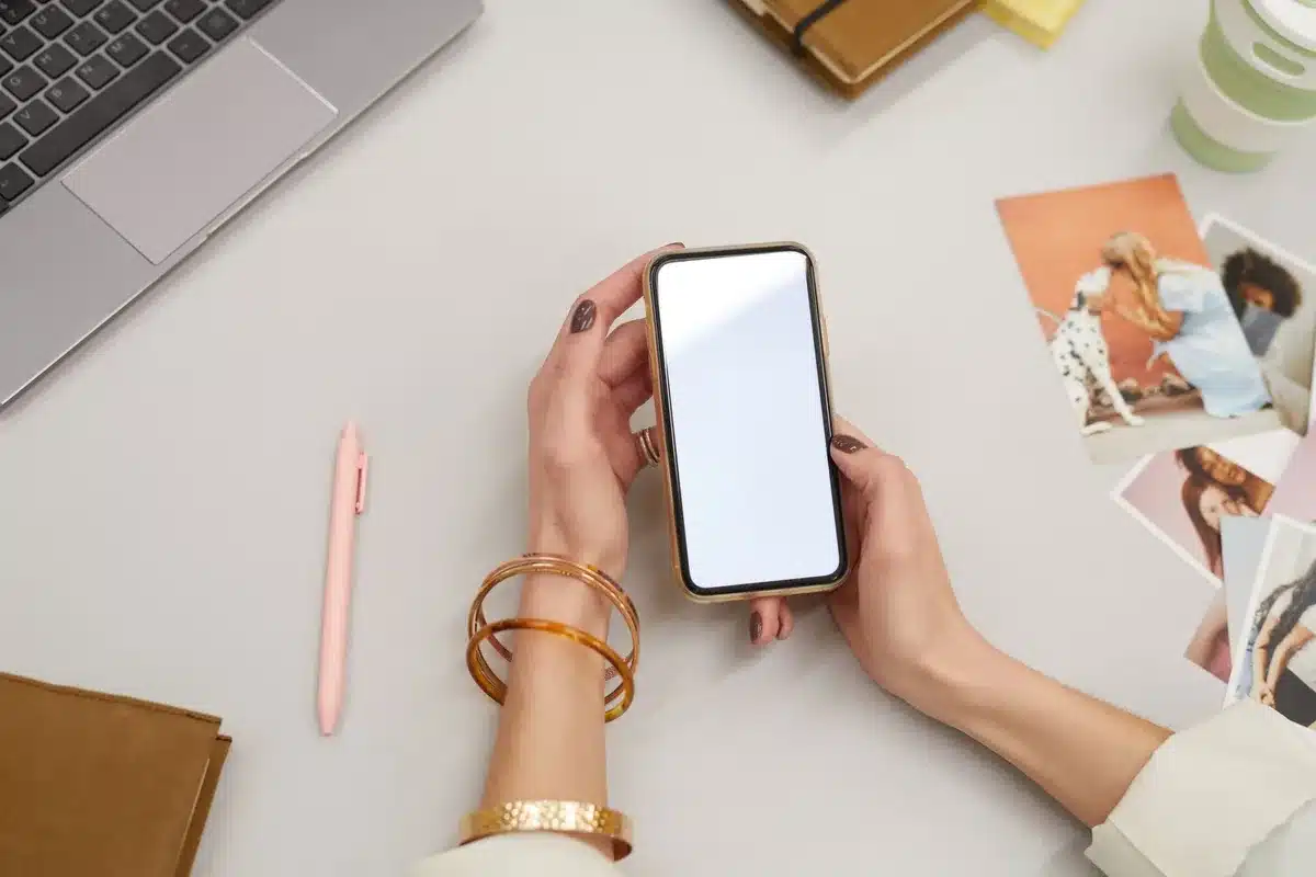 empty smartphone on table with update screen blurred