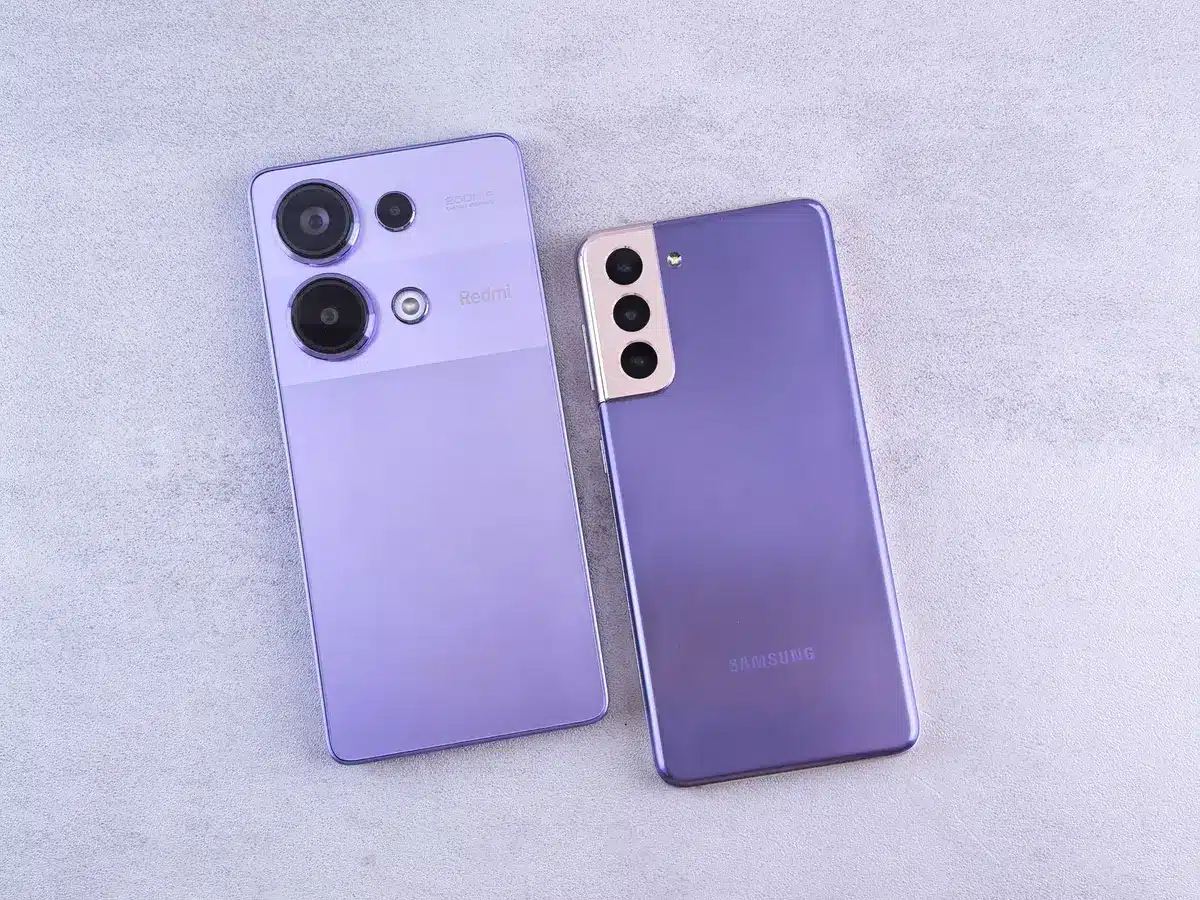 Rear phone module with large circular Leica-style camera module on a matte back, no logos visible, shallow depth of field