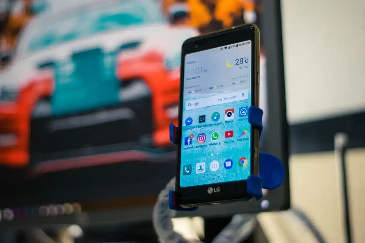 Empty smartphone home screen with several app icons dimmed and greyed out, one highlighted padlock overlay, no brands or logos