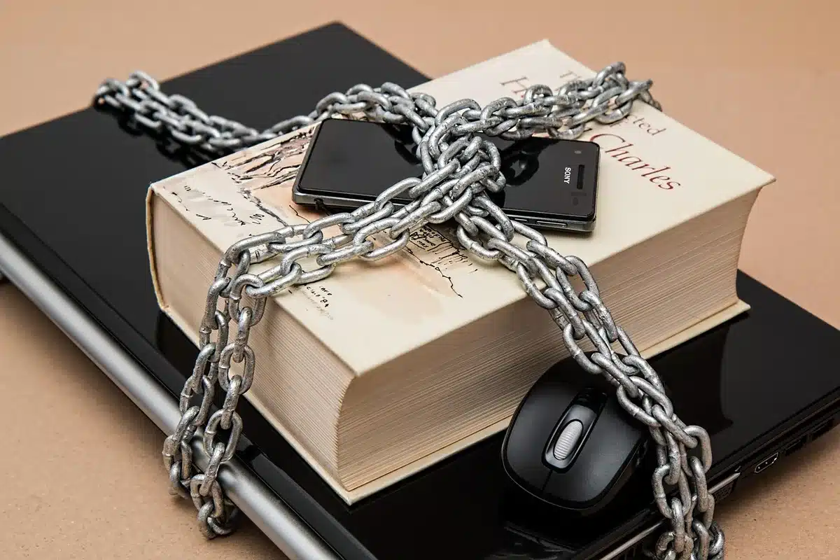 close-up of anonymous hands unboxing an unbranded smartphone, soft interior lighting