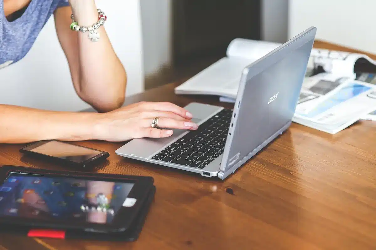anonymous scene of a modern smartphone on a desk showing a blurred conversational UI, no logos or readable text